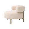 A glamorous chair by Eichholtz with a luxury upholstery and brushed brass legs 