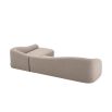 Luxurious sofa with curved backrest in grey upholstery