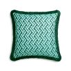 A contemporary cushion with a geometric print, bright colour and playful fringed border