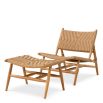 A stylish rattan outdoor chair and footstool by Eichholtz 