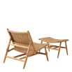 A stylish rattan outdoor chair and footstool by Eichholtz 