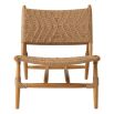 A stylish rattan outdoor chair and footstool by Eichholtz 