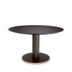 luxurious round dining table with gold platform
