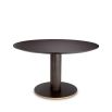 luxurious round dining table with gold platform
