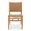 A stylish set of outdoor dining chairs by Eichholtz with intricate woven patterning and a teak wood finish