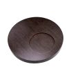 Round coffee table with dark wood top, sunken circular detail and gold accents
