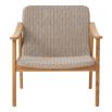 Elegant taupe coloured woven armchair for indoor or outdoor use