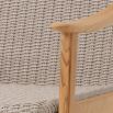 Elegant taupe coloured woven armchair for indoor or outdoor use