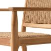 Natural teak outdoor dining chair with woven finish