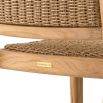 Natural teak outdoor dining chair with woven finish