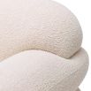 Plush, cloud-like armchair in boucle cream finish