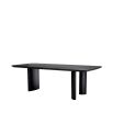 A luxury black veneer dining table by Eichholtz with offset playful table legs