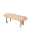 A lovely natural dining table by Eichholtz with playfully angled legs