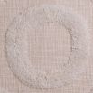 Cosy cotton cushion with tufted circular design