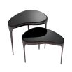 Set of 2 sculptural side tables in black nickel finish