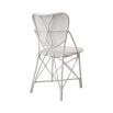 Intricate design rattan dining chair in white finish