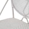 Intricate design rattan dining chair in white finish