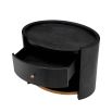 Charcoal grey bedside table with brass accents