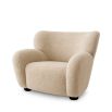 Sumptuously cosy armchair in irresistibly soft Canberra sand