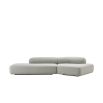 Stylish curved sofa upholstered in sleek grey upholstery