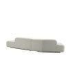 Stylish curved sofa upholstered in sleek grey upholstery