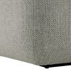 Stylish curved sofa upholstered in sleek grey upholstery