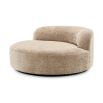 Sumptuous round sofa upholstered in soft Lyssa Sand fabric