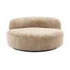 Sumptuous round sofa upholstered in soft Lyssa Sand fabric