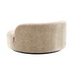 Sumptuous round sofa upholstered in soft Lyssa Sand fabric