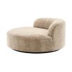 Sumptuous round sofa upholstered in soft Lyssa Sand fabric