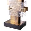 Modern table lamp with black shade and brass and glass cubist design