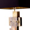 Modern table lamp with black shade and brass and glass cubist design