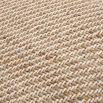 Small hand-woven, natural jute pillow with fringes