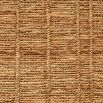 Hand knotted rug with a flat weave crafted from jute