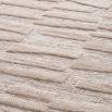 Wool beige rug with creamy textural accents