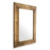 Mirror with large, bold frame in a vintage brass finish 