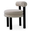 Elegant taupe upholstered dining chair with rounded features