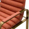 orange linen upholstered barstool with horizontal fluting and brass frame