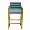 blue linen upholstered counter stool with horizontal fluting and brass frame