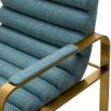 blue linen upholstered counter stool with horizontal fluting and brass frame
