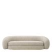A luxury sofa by Eichholtz with a gorgeous grey upholstery and brass plinth