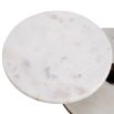Three level cake stand with white marble bases and bronze finishes