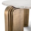 Opulent coffee table with layered brass legs