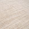 A contemporary bench by Eichholtz with a stunning sand coloured upholstery 