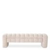 A contemporary bench by Eichholtz with a stunning sand coloured upholstery 