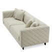 Upholstered modern sofa with chevron stitching detail