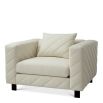 Upholstered modern armchair with chevron stitching detail in reve cream