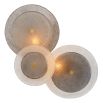 Gorgeous wall light featuring frosted glass and antique brass accents