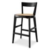 A stylish barstool by Eichholtz with a black composition and rattan seat