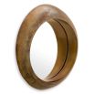 Vintage brass round mirror boasting sleek circular form